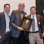 John Henry Homes Founders Jon Blatt and Josh Blatt present lifetime achievement award top friend and mentor Robert Rhein